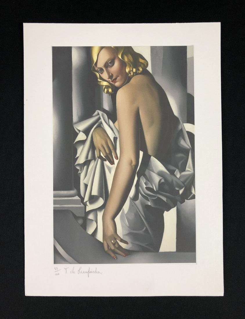 Tamara de Lempicka (1898-1980) - Hand Inscribed Print: This lot consists of a fine art print on paper, with "T. de Lempicka" handwritten at bottom. To the left of the signature is the hand-numbering "31/100" handwritten in graphite. Image depicts a sleek