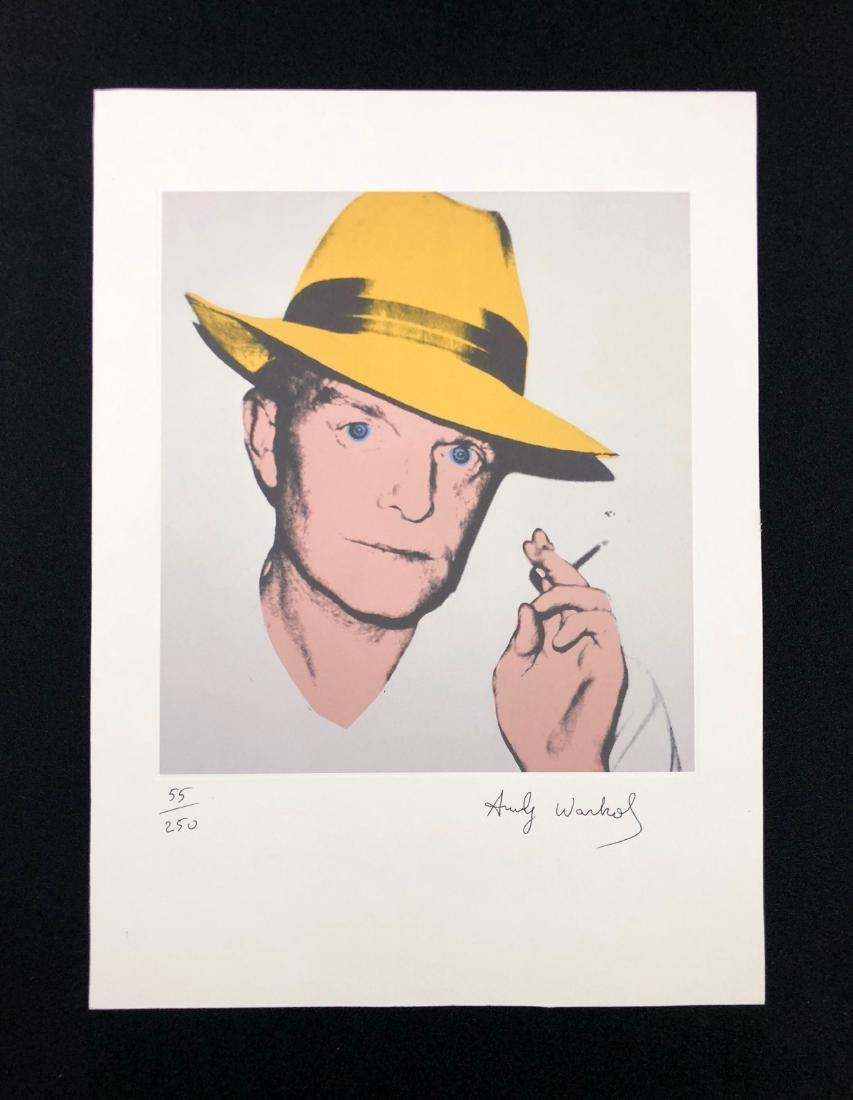 In the style of Andy Warhol-- Fine: This lot consists of a fine art print on paper, "Andy Warhol" at bottom right. Numbered "55/250". Image depicts the American writer Truman Capote (1924-1984) sporting a warm yellow fedora and casually