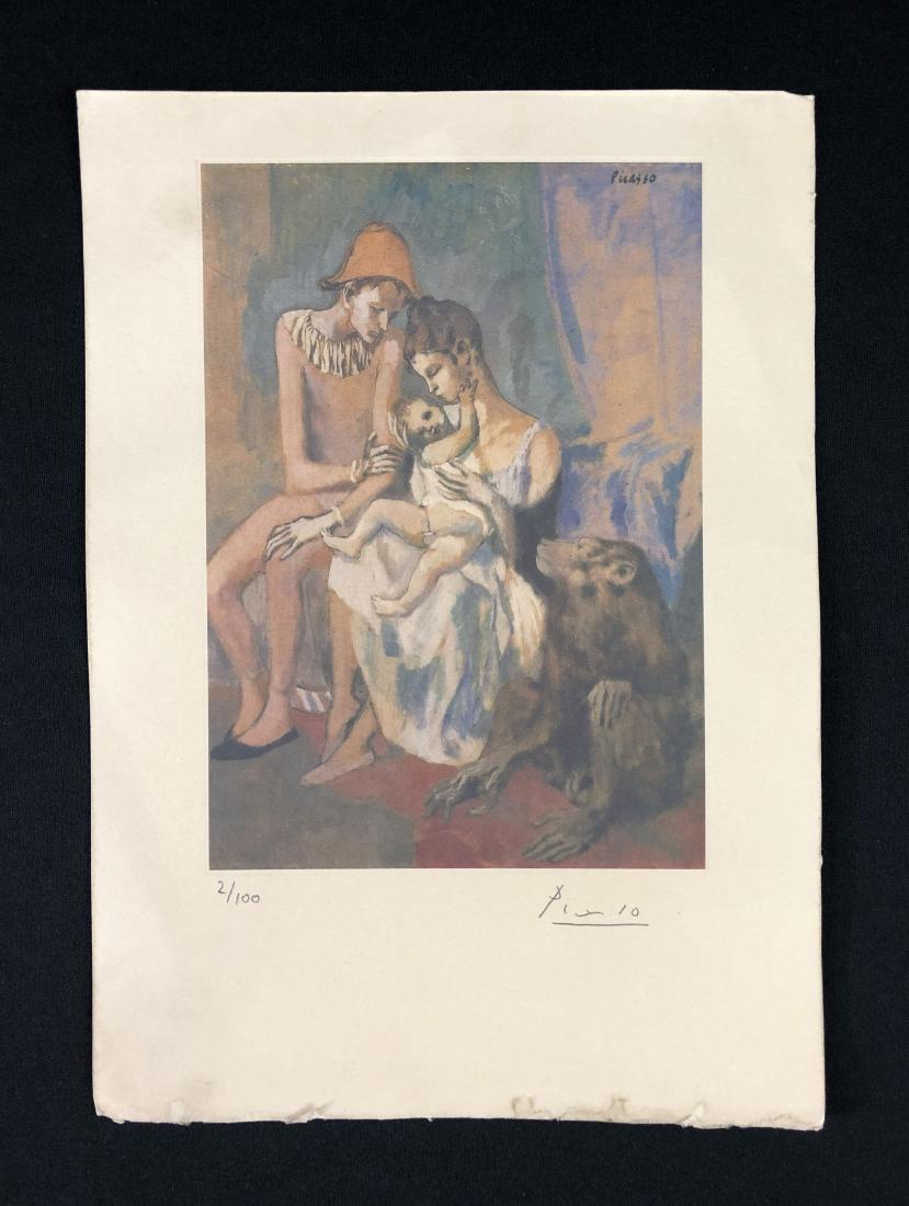 In the style of Pablo Picasso-- Fine: This lot consists of a fine art print on paper, "Picasso" and numbered "2/100" in graphite at bottom. Image depicts a young family having a private moment behind the curtains of the circus. The young 