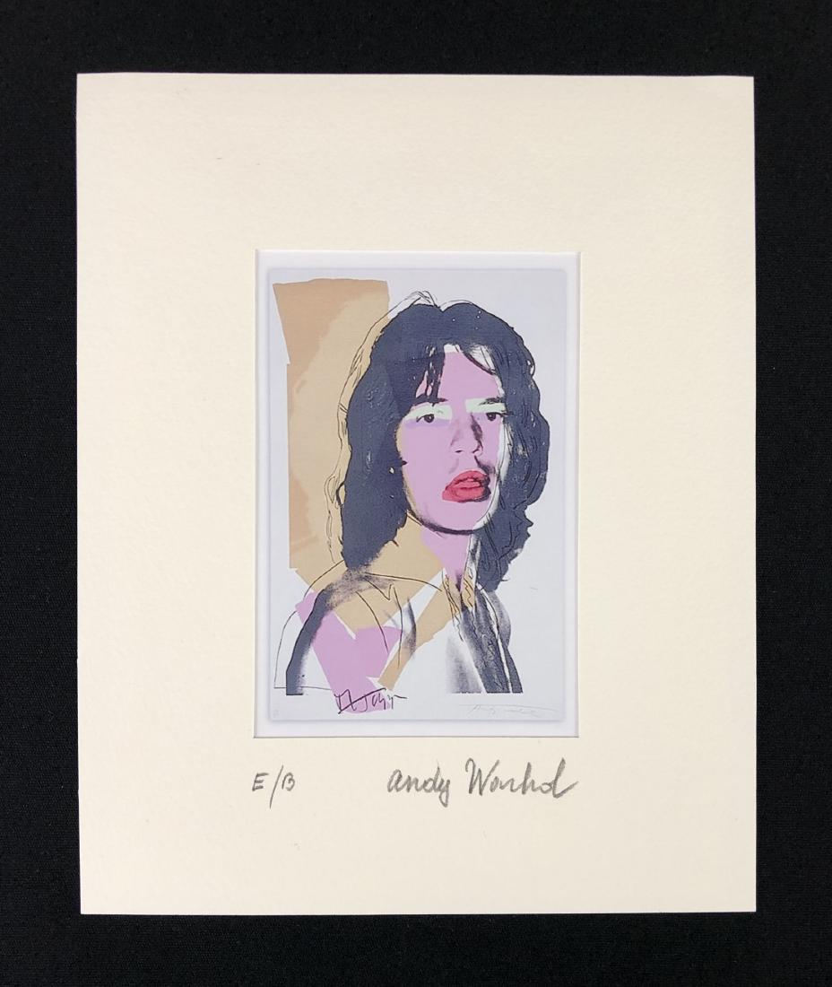 In the style of Andy Warhol-- Fine Art Print on: This lot consists of a fine art print on paper, matted and . Handwritten graphite inscriptions at bottom read, "E/B" and, "Andy Warhol". This vibrant, Pop Art image depicts famed Rolling Stones frontm