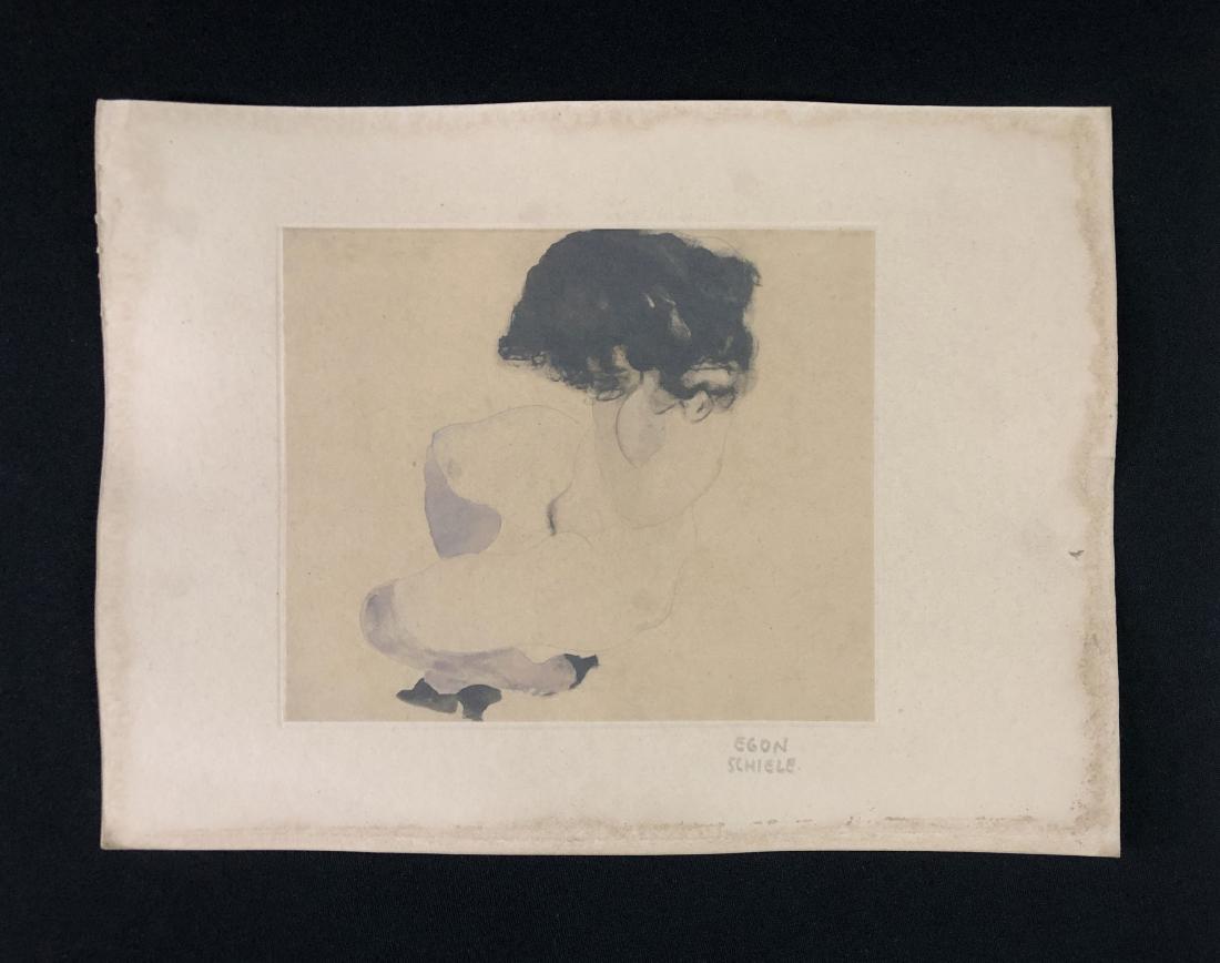 In the style of Egon Schiele-- Fine: This lot consists of a fine art print on paper, and dated "Egon Schiele " at bottom right. Image depicts a raven-haired female figure as seen from above. Her body is grey, amorphous. She wears only st