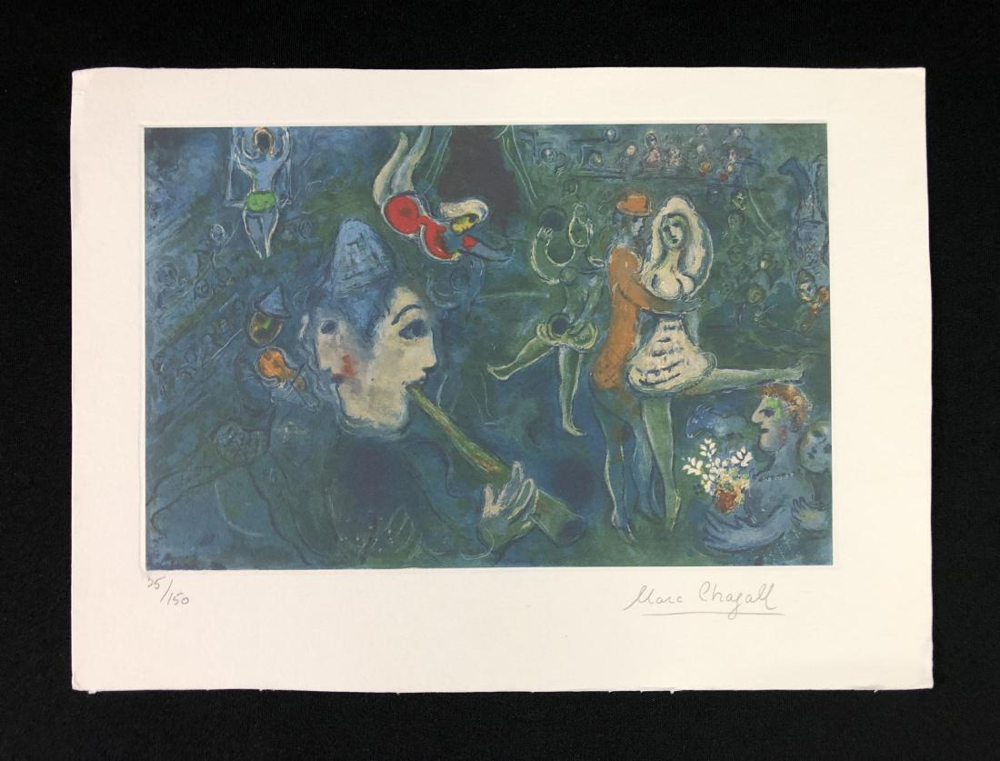 In the style of Marc Chagall--: This lot consists of a fine art print on paper, "Marc Chagall" and numbered "35/150" in graphite at bottom. Image depicts a moody circus scene, with a piper in the foreground and multiple figures walt