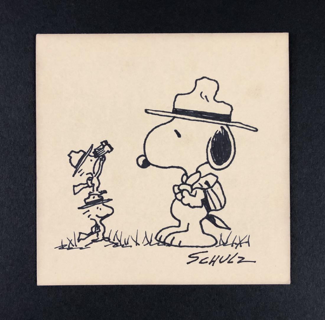Charles Schulz (American, 1922-2000) - Ink Drawing: This lot consists of a hand-drawn ink illustration on heavy brown paper, attributed to the famed cartoonist Charles Schulz (American, 1922-2000). "Schulz" is hand written at bottom right. Image depict