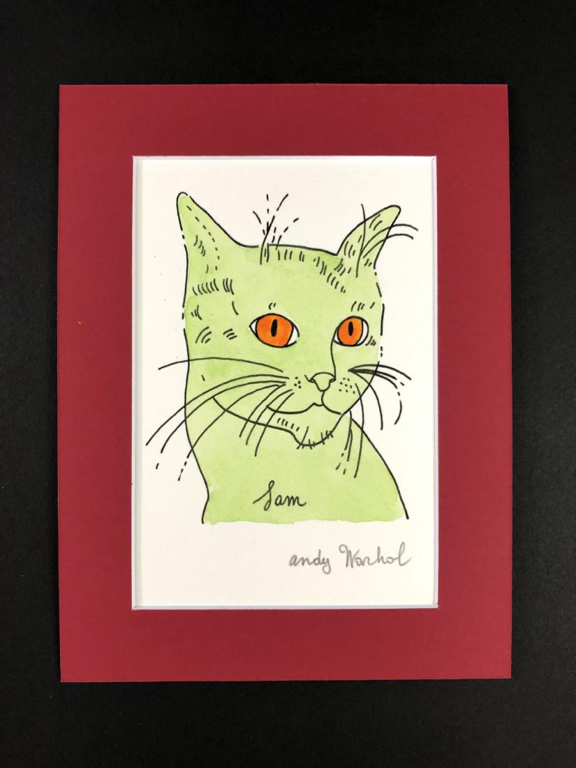 Andy Warhol (1928-1987) â€“ Mixed Media on Paper: This lot consists of a matted mixed media (ink and watercolor) on paper, attributed to Andy Warhol (American, 1928-1987). This Pop Art image depicts the head of a green cat with orange eyes, very simi