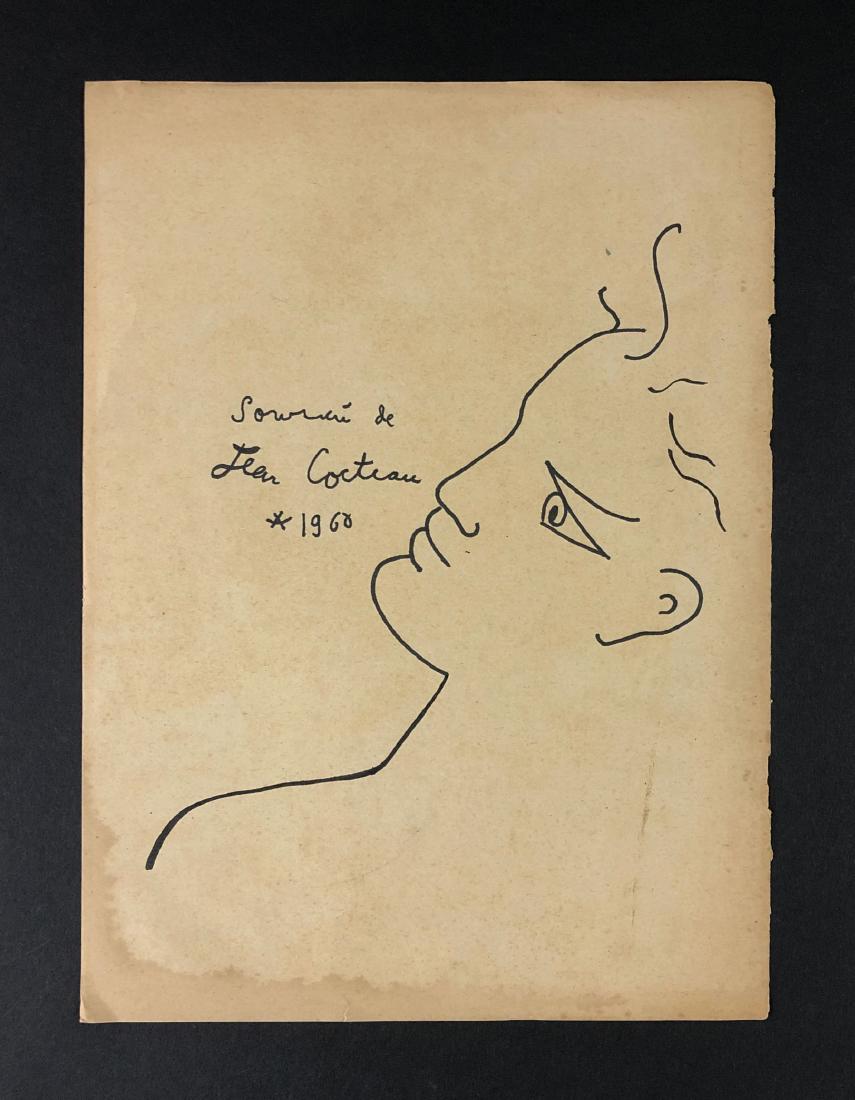 Jean Cocteau (French, 1889 -1963) -- Ink Drawing: This lot consists of a ink drawing on antique sheet music paper, attributed to the modern artist Jean Cocteau (French, 1889-1963). "Jean Cocteau" is hand written at bottom left. Below the signature is