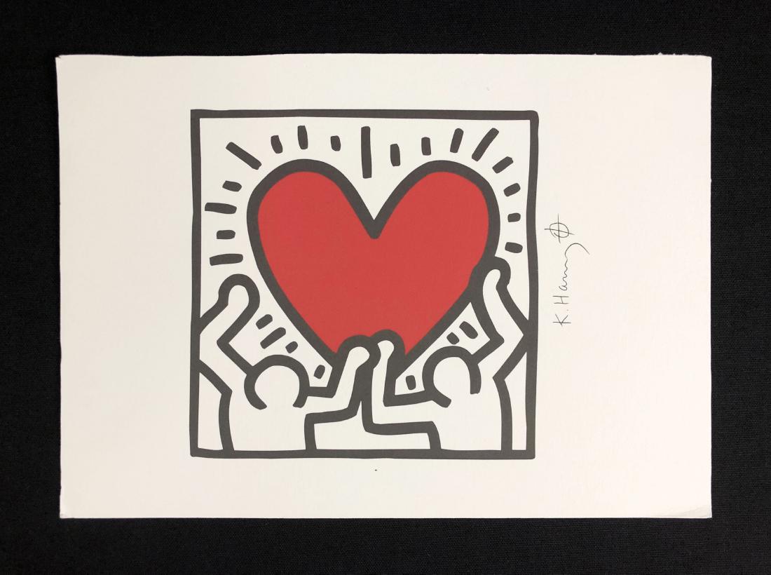 Keith Haring (American, 1958-1990) - Fine Art Print: This lot consists of a fine art print on paper, attributed to Keith Haring (American, 1958-1990). "K. Haring" is hand written. Signature is accompanied by a small crosshair symbol. Image depicts a lar