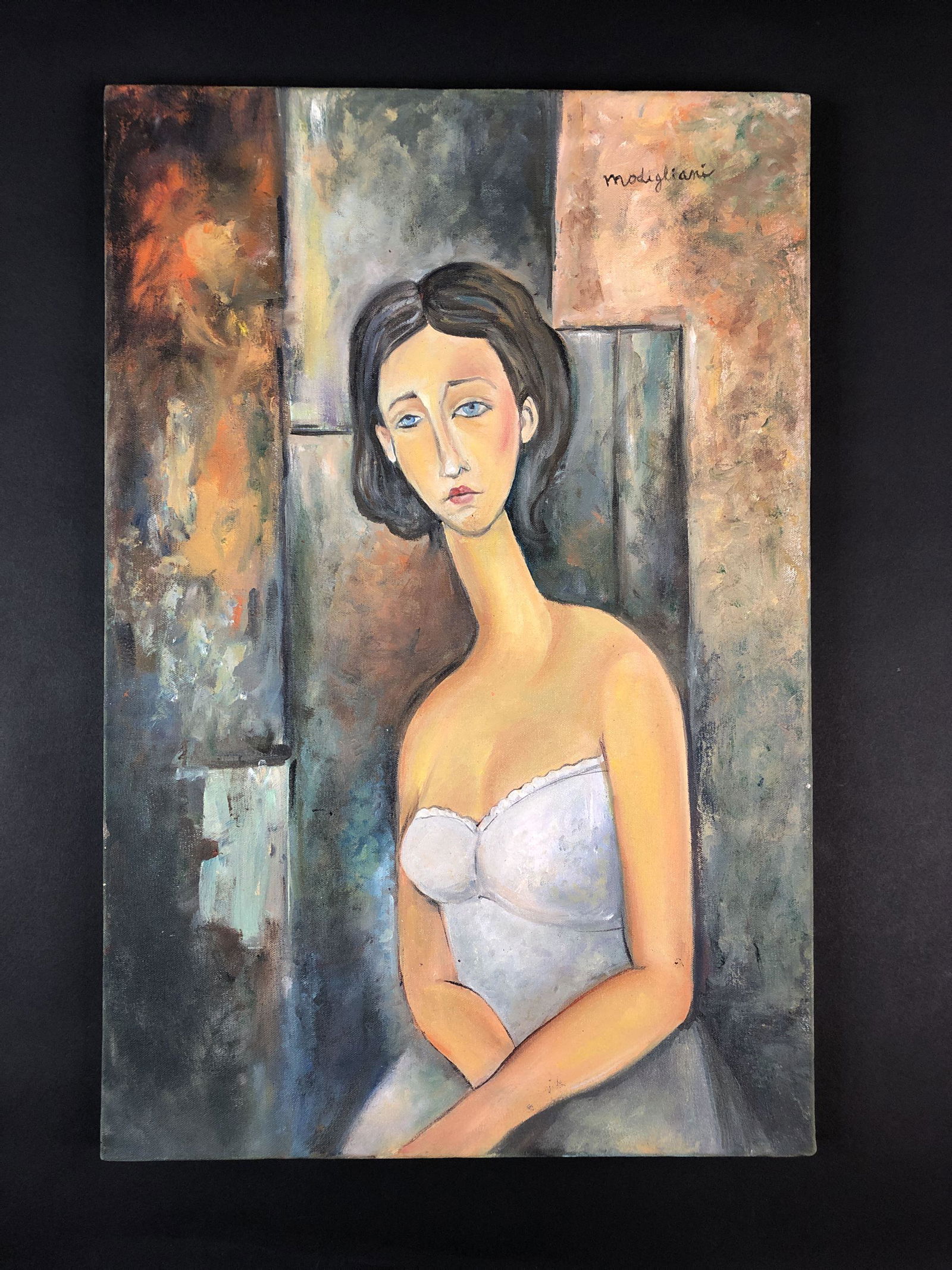 Amedeo Modigliani (Italian, 1884-1920) - Oil on Canvas: This lot consists of an unframed oil painting on canvas, rendered in the modern style of artist Amedeo Modigliani (Italian, 1884-1920). "Modigliani" is hand-written at top left. Image depicts a brunet