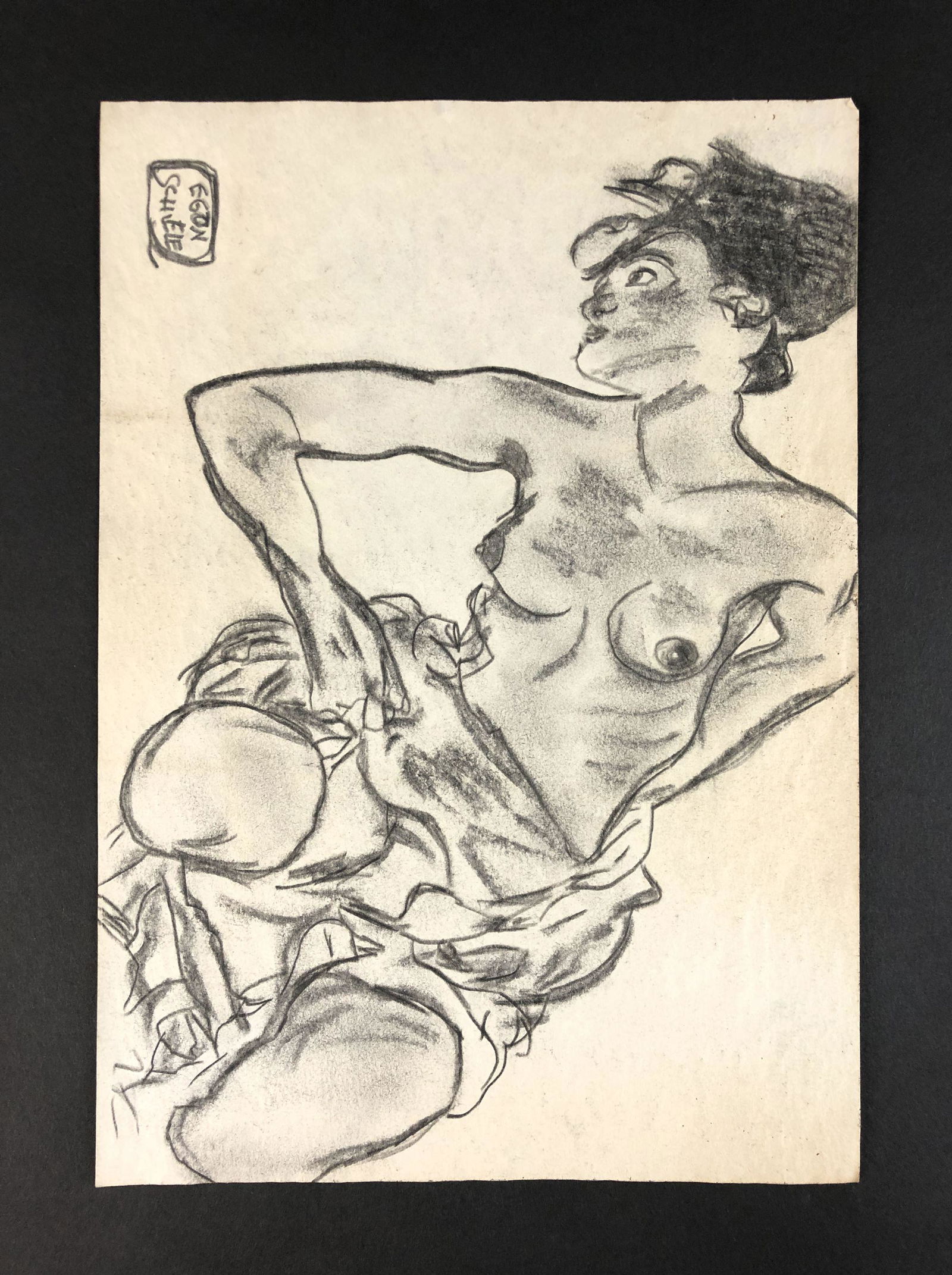 Egon Schiele (1890-1918) - Mixed Media on Paper: This lot consists of a graphite and charcoal illustration on paper, done in the sensual, Art Nouveau style of Egon Schiele (Austrian, 1890-1918). "Egon Schiele" is inscribed at lower left. Image depic