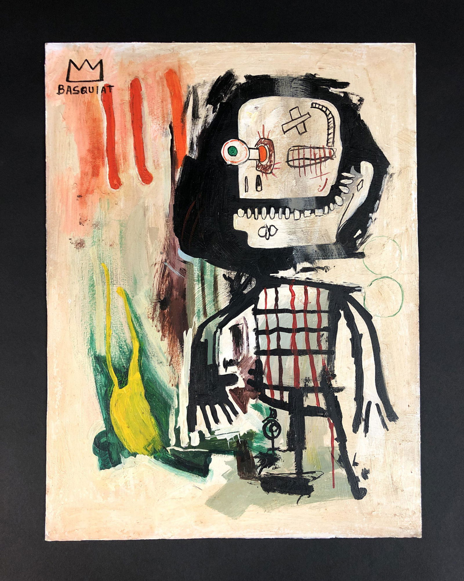 Jean-Michel Basquiat (1960-1988) - Acrylic Painting: This lot consists of an unframed acrylic painting on paper board, done in the pop art style of street artist Jean-Michel Basquiat (American, 1960-1988). Image depicts a skeletal figure with his eyebal
