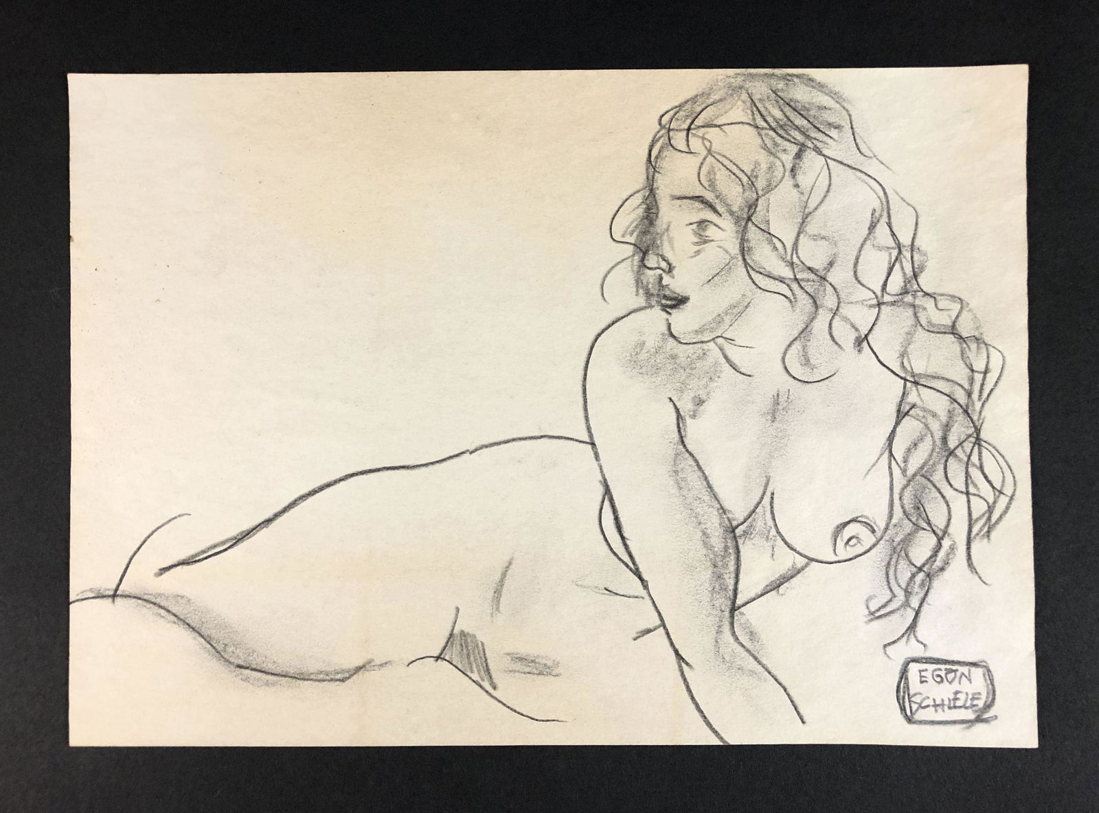 Egon Schiele (Austrian, 1890-1918) - Graphite on Paper: This lot consists of a graphite illustration on paper, done in the sensual, Art Nouveau style of Egon Schiele (Austrian, 1890-1918). "Egon Schiele" is inscribed at lower left. Image depicts a nude fem
