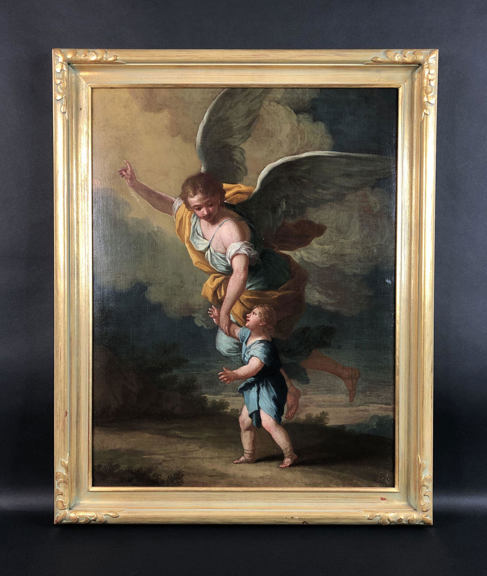 Oil Painting On Canvas - Late 19th / Early 20th Century: This lot consists of a framed oil painting on canvas, done in the romantic Victorian style. Image depicts a feathery-winged angel in billowing robes tenderly leading a small child forward. Atmospheric