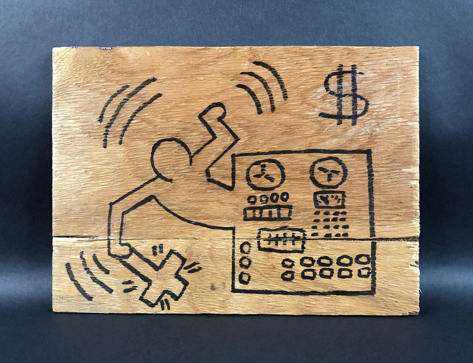 Keith Haring - Marker on Wood (style of): This lot consists of an unframed marker illustration on plywood. This simple yet powerful depiction is executed in the contemporary, street art style of pop artist Keith Haring (American, 1958-1990). 