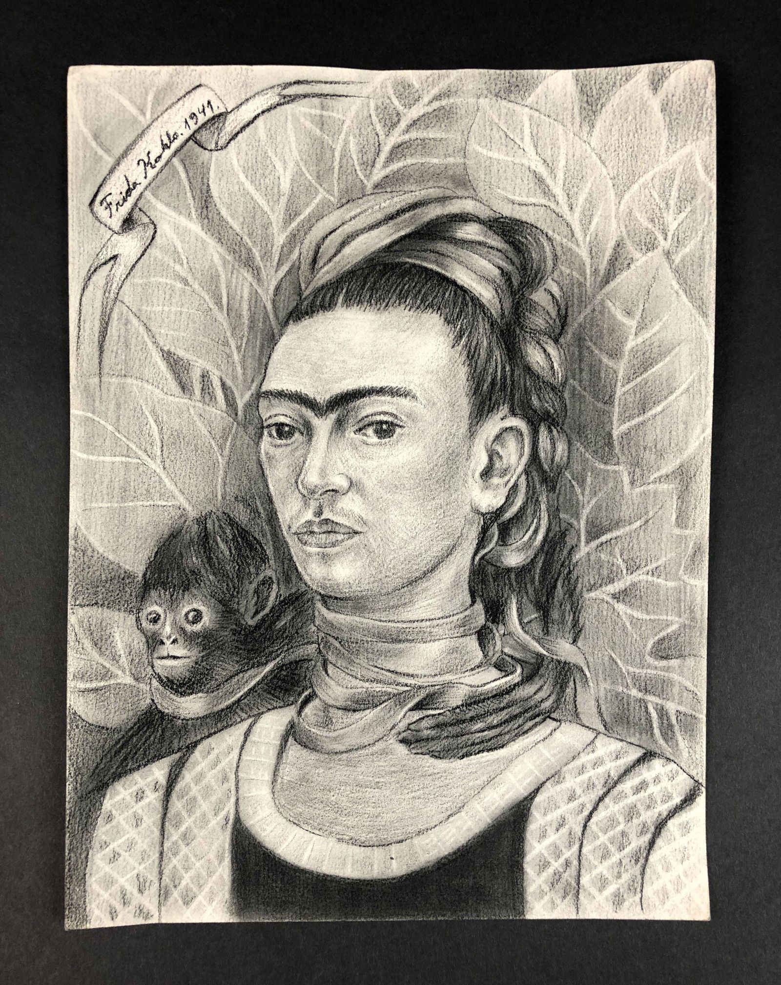 Frida Kahlo - Charcoal on Paper (style of): This lot consists of an unframed charcoal illustration on paper, done in the modern style of Frida Kahlo (Mexican, 1907-1954). Handwritten inscription at top left corner reads, "Frida Kahlo. 1941." Th