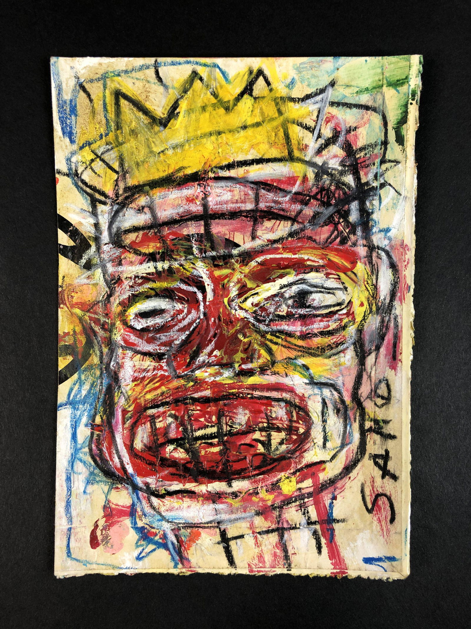 Jean-Michel Basquiat - Pastel/Board (style of): This lot consists of a hand painted pastel illustration on cardboard, done in the style of the elusive street artist, Jean-Michel Basquiat (American, 1960-1988). The crowned, skeletal figure at the ce
