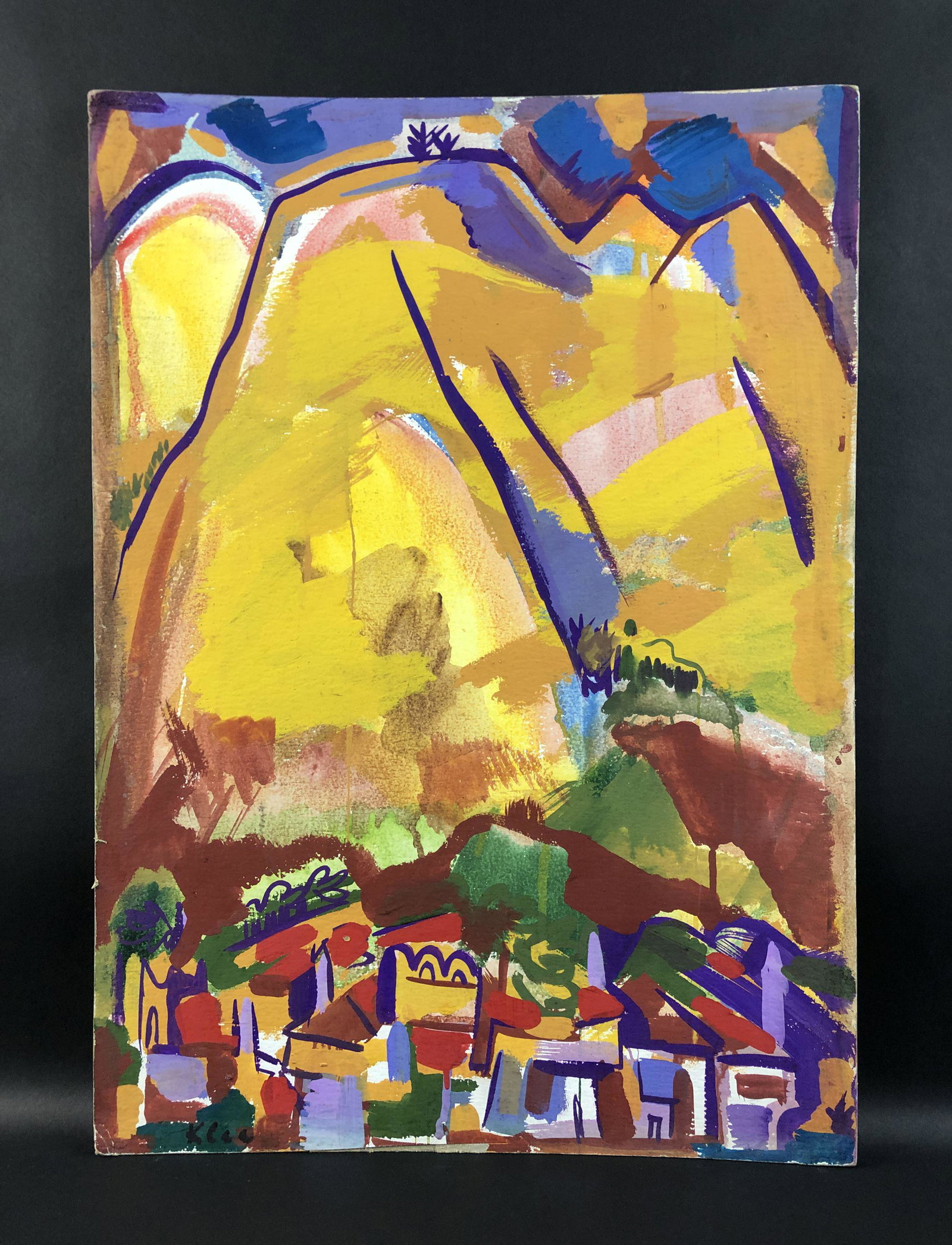 Paul Klee - Tempera Painting on Board (style of): This lot consists of an unframed tempera painting on board, done in the soft, energetic style of Paul Klee (German, 1879-1940). This image depicts a cozy village nestled at the base of large mountains