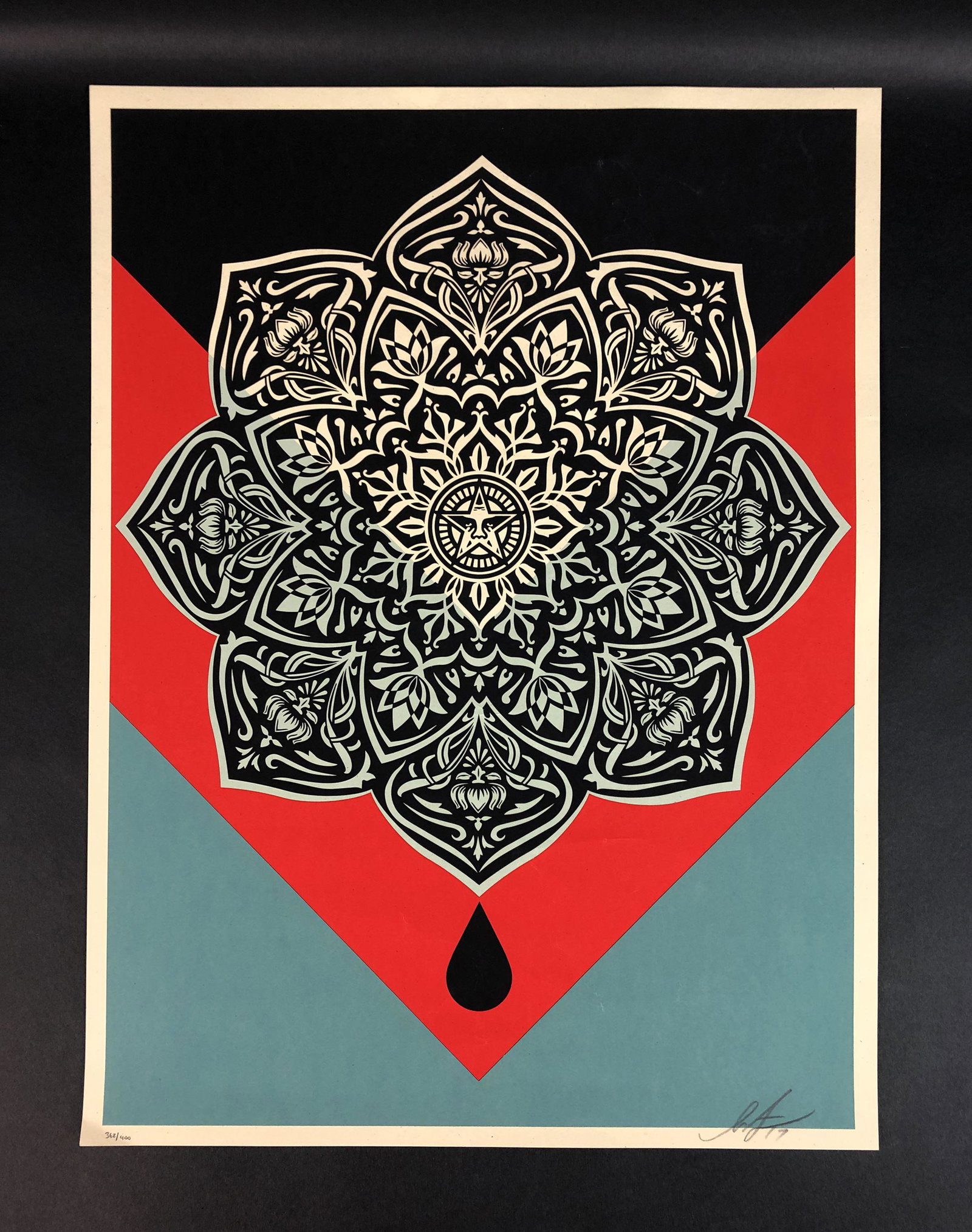 Shepard Fairey (1970 - ) - Style of - Fine Art Print: This lot consists of an exquisite fine art poster print, done in the style of Shepard Fairey (American, 1970 - ). Image depicts a blossoming mandala symbol with a popular design (Andre the Giant's eye