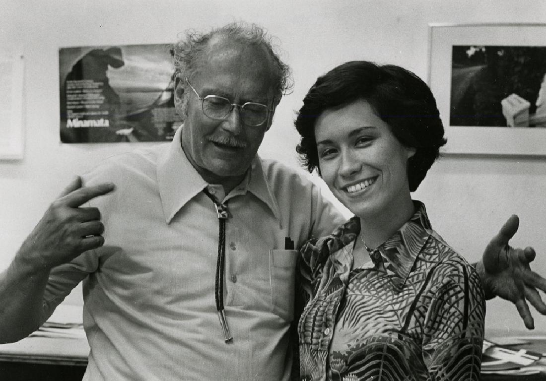W. EUGENE SMITH AND LESLIE TEICHOLZ: W. EUGENE SMITH AND LESLIE TEICHOLZ, by Leslie Teichholz. 5 1/2 x 7 1/2 inch gelatin silver print on 8 x 9 1/2 inch sheet, with Teichholz's 450 West 20th Street stamp. ca. 1975. From her September 201