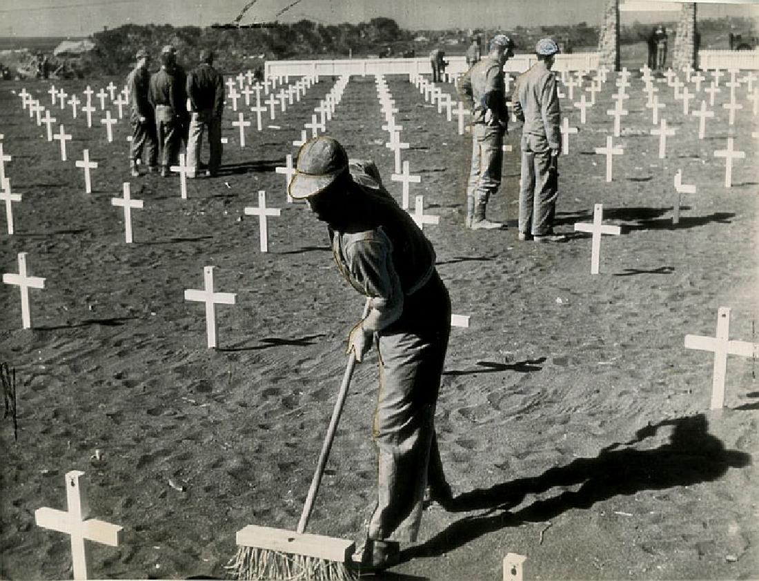 W. EUGENE SMITH, Graves of Marines killed on Iwo Jima.: W. EUGENE SMITH, Graves of Marines killed on Iwo Jima. A newspaper clipping of the photo is attached verso, with a use stamp for Mar. 23, 1945, when Smith returned to Iwo Jima. This was published in L