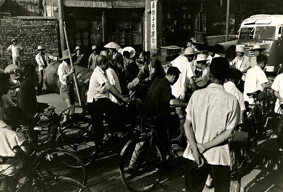 Scene in China. 6 Â½ x 9 Â½ - inch: Scene in China. 6 Â½ x 9 Â½ - inch gelatin silver print with Capa's 1961 Magnum stamp and Magnum "15 West 47th Street" stamp. It is possible that the Cornell Capa stamp was misapplied as he was no