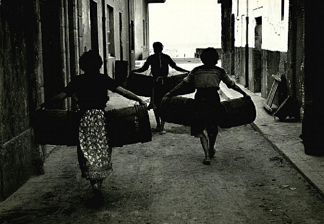 BRUCE DAVIDSON, Two photographs from Sicily, 1961.: BRUCE DAVIDSON, Two photographs from Sicily, 1961. Young girls walk in the street. 13 1/4 x 8 ¾ - inch gelatin silver print. "A195" in pencil on verso. [4] Plus 8 ¾ x 13 ¼ - inch gelatin silver pri