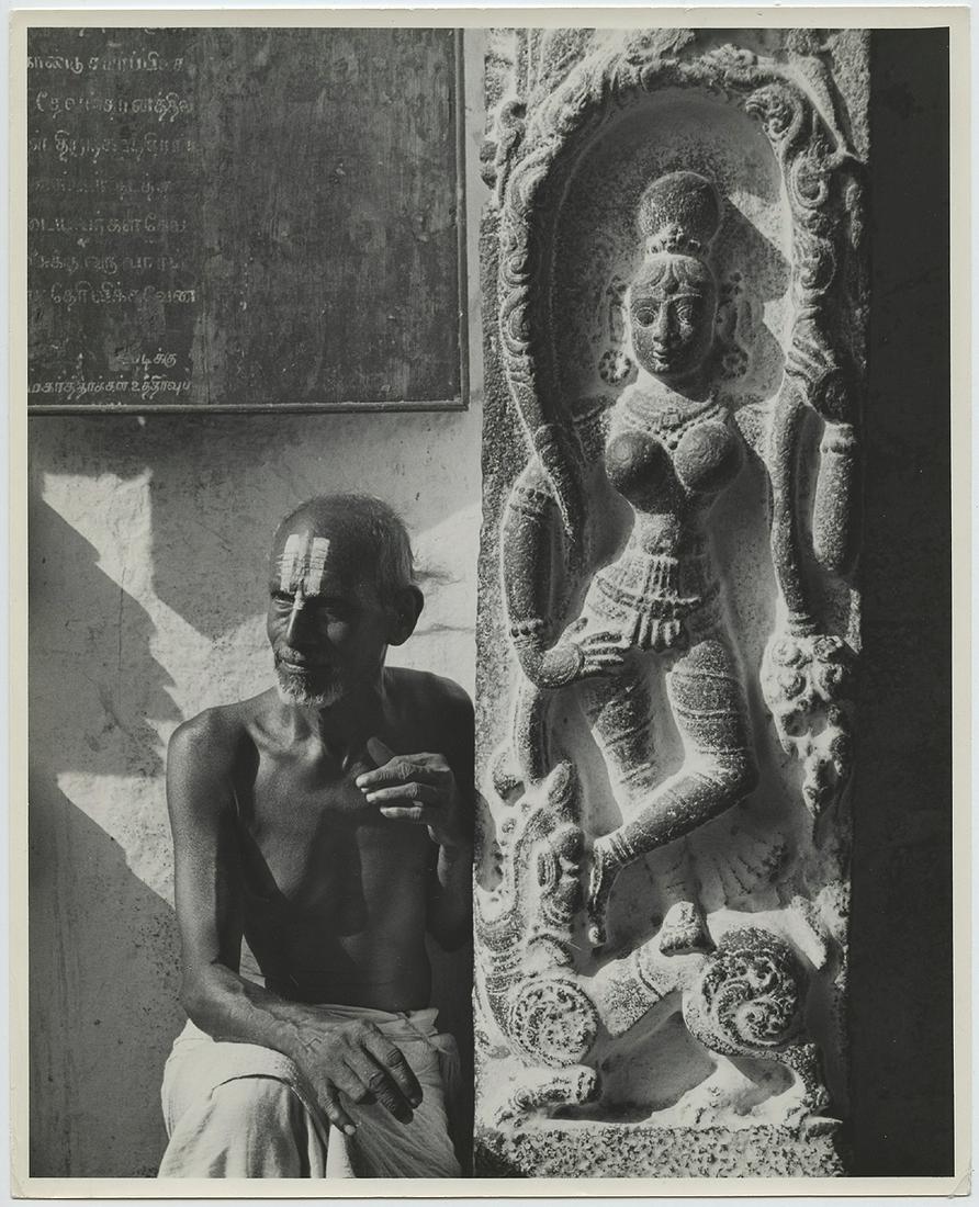 John Gutmann. Three Portraits withArchitecture in India: John Gutmann. Three portraits with architecture in India. 10 x 8 gelatin silver prints, one ferrotyped on single weight paper. 1945. All have Gutmann's PIX stamp. And titles in pencil -- “Attendant