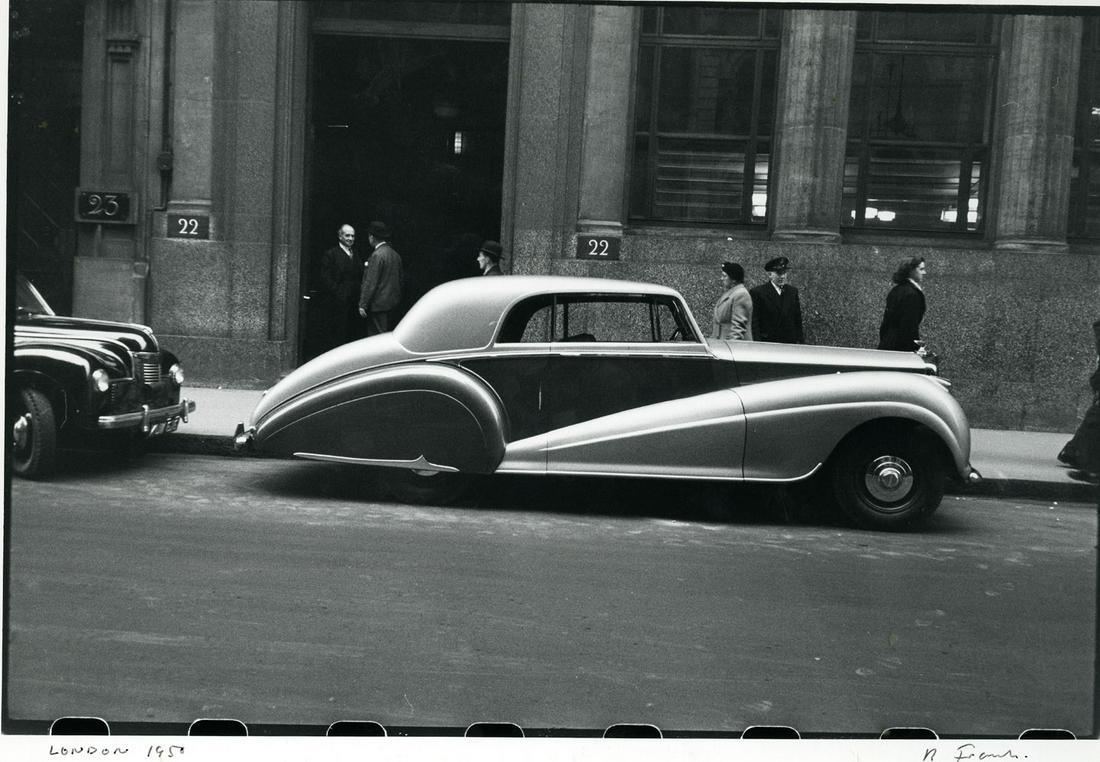 ROBERT FRANK. “London.”: ROBERT FRANK. “London.” 9 x 13 3/8 image on a 10 ½ x13 ¾ inch sheet, on a 13 x 17 ¼ inch mount. Silver print signed, titled and dated “1950” in pencil bene