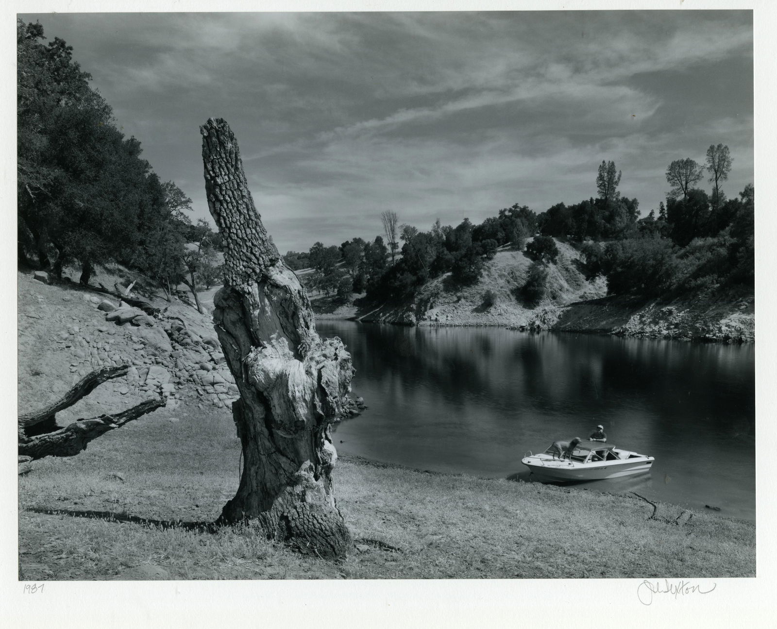 JOHN SEXTON. (1953- ), “Ray Danielson & Jake in boat Nacimiento California”: JOHN SEXTON. (1953- ), “Ray Danielson & Jake in boat Nacimiento California” 13 x 10 ¼ silver print, dry mounted. 1987, printed 1987, Information written on a label on the mount vers