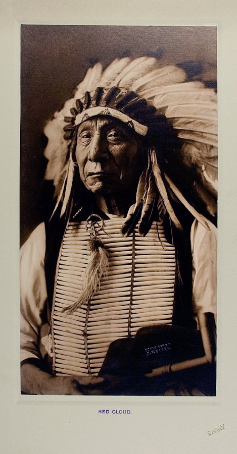 RED CLOUD (Mahpiya Luta), Oglala Lakota, by D. F. Barry: RED CLOUD (Mahpiya Luta), Oglala Lakota, by D. F. Barry at New York City, 1887. 13 7/16 x 7 1/16 POP print mounted on rough-edged gray paper, in turn mounted on a heavy 21 ¾ x 11 14/16 board with gra