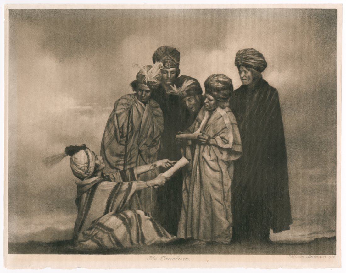 "THE CONCLAVE" BY WILLIAM MORTENSEN.: "THE CONCLAVE" BY WILLIAM MORTENSEN. 10 ½ x 14-inch bromoil print on textured paper, titled, signed and dated 1933 by Mortensen in pencil on the bottom margin. Mounted on original board, with "Bromol