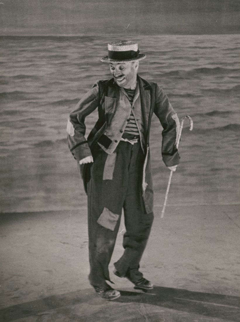 CHARLIE CHAPLIN DANCING by W. Eugene Smith: CHARLIE CHAPLIN DANCING, 1952, by W. Eugene Smith. 9 3/8 x 7- inch image on 14 x 10 7/8- inch sheet, gelatin silver print on double weight paper, with circular collection stamp on verso. Provenance: C