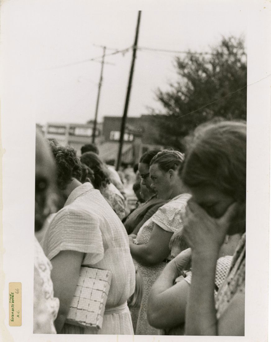 "ELIZABETHTOWN, S.C." by ROBERT FRANK.: "ELIZABETHTOWN, S.C." by ROBERT FRANK. 14 x 10 ¾ inch gelatin silver print, 1955. Signed on verso, with "South Carolina" and "1955" in ink. A small label on the left margin has "Elizabethtown/N.C."