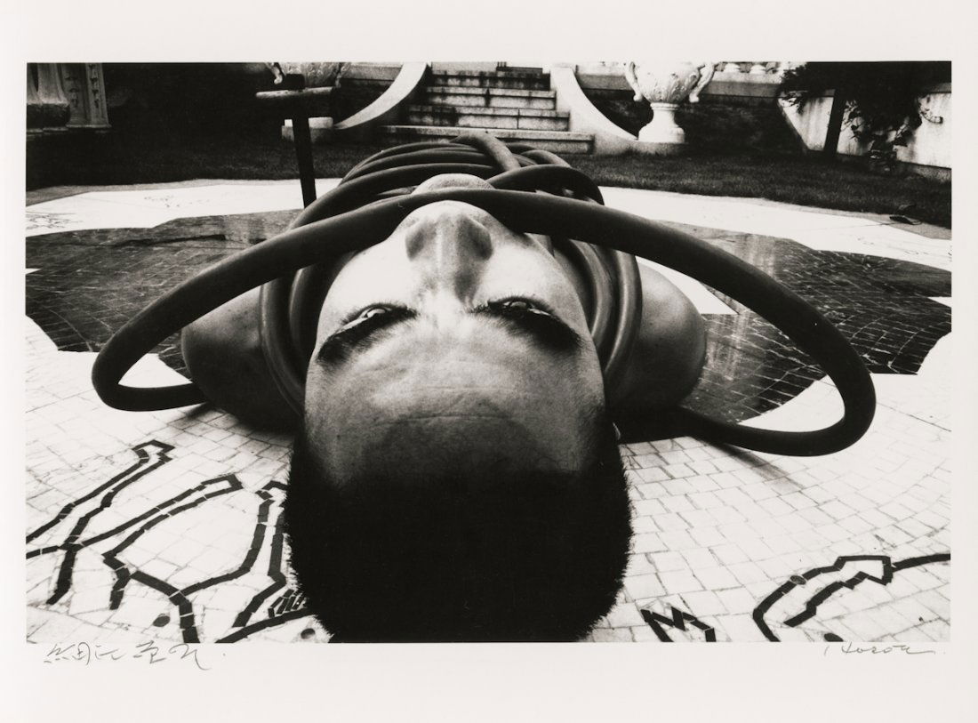 "ORDEAL BY ROSES" #6, 1961, by Eikoh Hosoe.: "ORDEAL BY ROSES" #6, 1961, by Eikoh Hosoe. 9 3/8 x 11- inch gelatin silver print, signed beneath in Japanese and English, titled, signed and dated 1963 on verso. Printed ca. 1970's. [4]