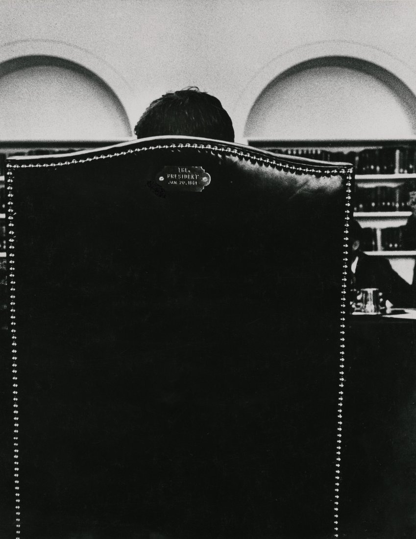 J.F.K. BACK VIEW CABINET MEETING 1961 Cornell Capa.: J.F.K.'s FIRST CABINET MEETING, 1961, by Cornell Capa. 14 x 11 gelatin silver print with Capa's 1967 Magnum stamp and other notations verso.