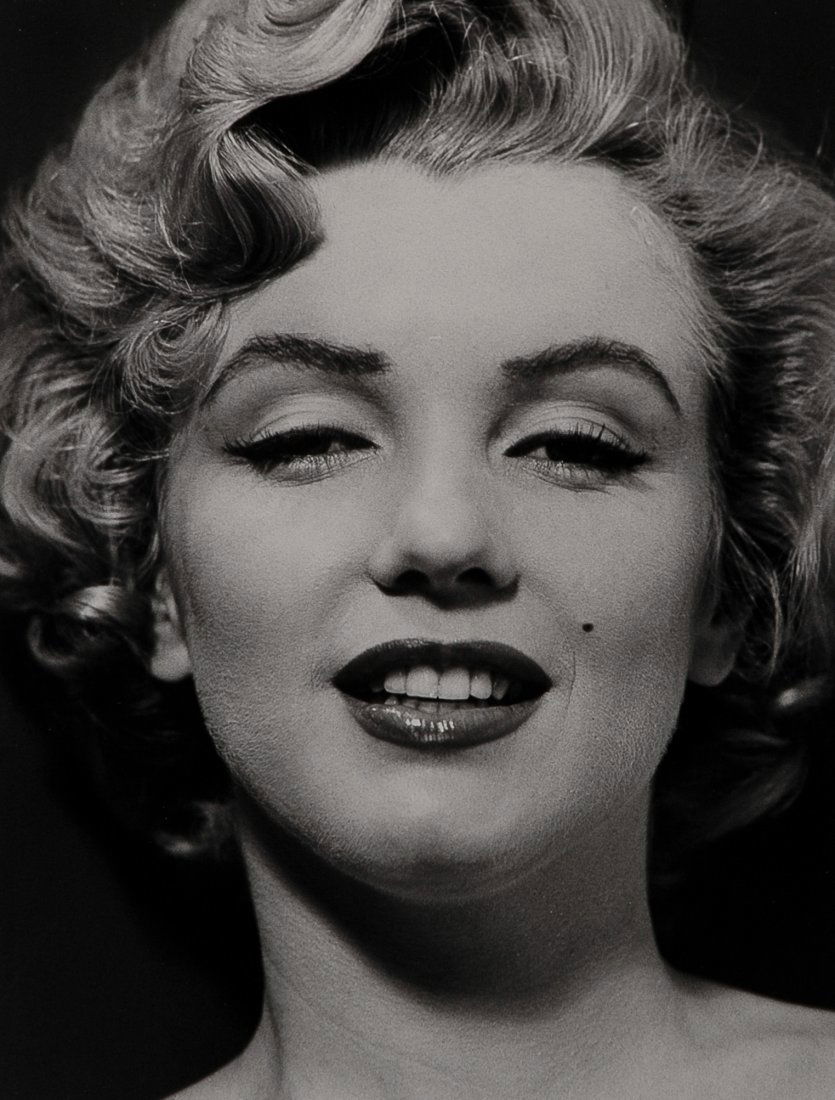MARILYN'S FACE, BY PHILIPPE HALSMAN.: MARILYN'S FACE, BY PHILIPPE HALSMAN. 11 x 8 ½- inch gelatin silver print, 1952, printed 1981 from the portfolio "Halsman/Marilyn" by the Neikrug Press, printed by Stephen Gersh. This is one of 3 prin
