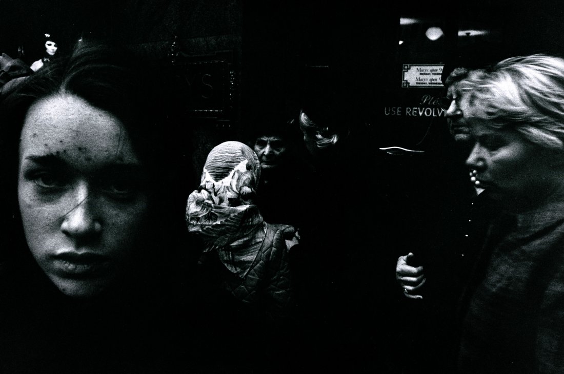 MACY'S, XMAS SHOPPING N.Y. 1955 BY WILLIAM KLEIN.: "MACY'S, XMAS SHOPPING N.Y. 1955" BY WILLIAM KLEIN. 9 3/8 x 14- inch image on 11 7/8 x 15 ½- inch paper, signed and dated 1986 with title in pencil, verso.