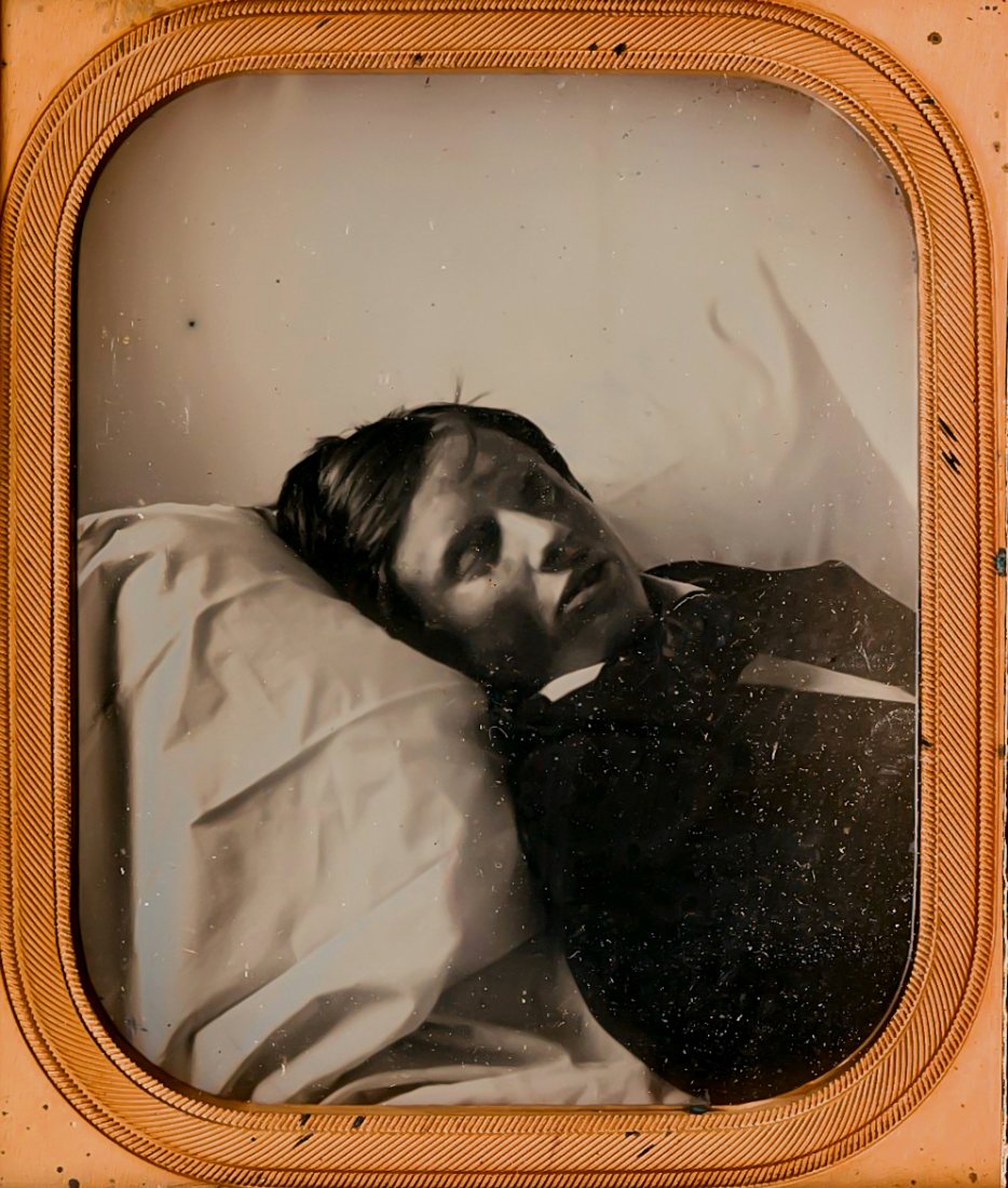 POST MORTEM OF A BOY, 1/6 PLATE DAGUERREOTYPE: POST MORTEM OF A BOY, 1/6 PLATE DAGUERREOTYPE. Propped up on pillows, his close face allows his features to register clearly. The coloration is subtle and remarkable. In a full case, this is sealed al