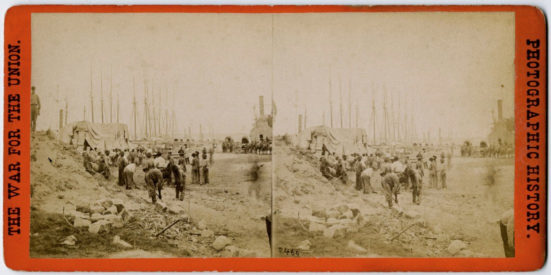 BRADY CIVIL WAR STEREO VIEW BLACK WORKERS CITY POINT: BRADY STEREO VIEW 2460. "Army Stores and Vessels at City Point, Va." Published by Anthony on an orange/white mount with a large blue label on the verso that credits Brady. We see a large group of blac