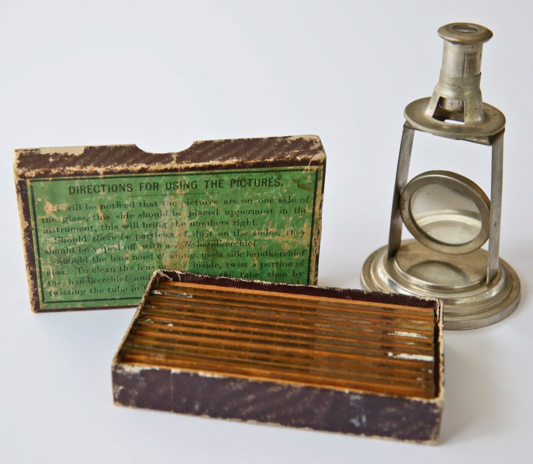 THE MICROGRAPH RARE MICROSCOPE VIEW ORIGINAL BOX: THE MICROGRAPH. A simple microscope-like viewer, with eyepiece and reflector, in the original wooden box with the fragile catalog pages and a box of 10 glass strips each containing 10 tiny transparenc
