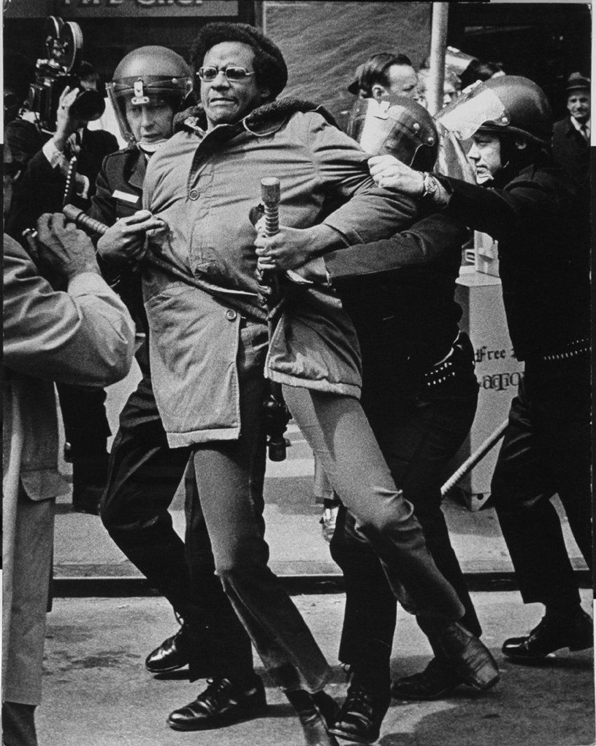 DETROIT WAR PROTESTER BY JOHN COLLIER, ca. 1965 - 67.: DETROIT WAR PROTESTER BY JOHN COLLIER, ca. 1965 - 67. 20 x 15 5/8- inch gelatin silver print on board, ferrotyped. This is an exhibition print submitted for competition by Collier, who was a photograp