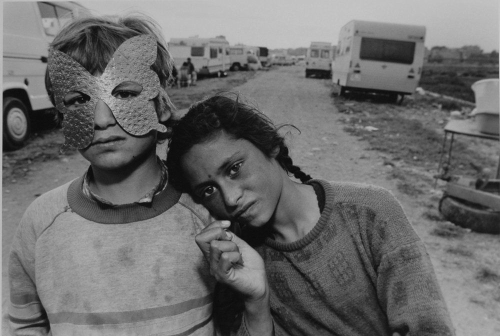 MARY ELLEN MARK, “GYPSY CAMP BARCELONA SPAIN – 1987.”: MARY ELLEN MARK, “GYPSY CAMP BARCELONA SPAIN – 1987.” 13 x 19 - inch gelatin silver print on 16 x 20- inch sheet. Dry mounted. Signed, with title and dedication on the bottom margin, small “#