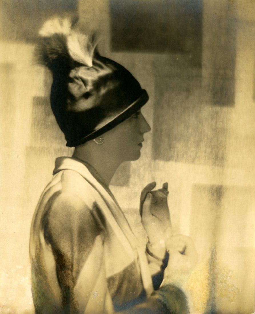 De Meyer, 2 modernist photos of his wife Olga in hat: BARON A. DE MEYER, OLGA IN HAT, 1912. Two- matte gelatin silver (bromide) prints, 8 1/4 x 7 1/8 - inches and 9 1/4 x 7 3/8 inches, dry mounted with the mounts trimmed to the prints. These are closely