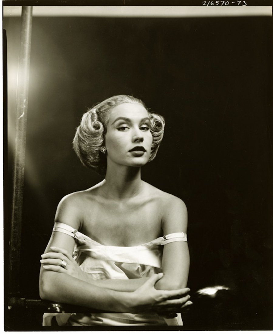 Herbert Matter, Lisa Fonssagrives, 1945: HERBERT MATTER, LISA FONSSAGRIVES. 10 x 8 gelatin silver print, ferrotyped, ca. 1945, printed later. . Matter's NYC studio stamp is on the verso. This is a beautiful portrait of the young model. This