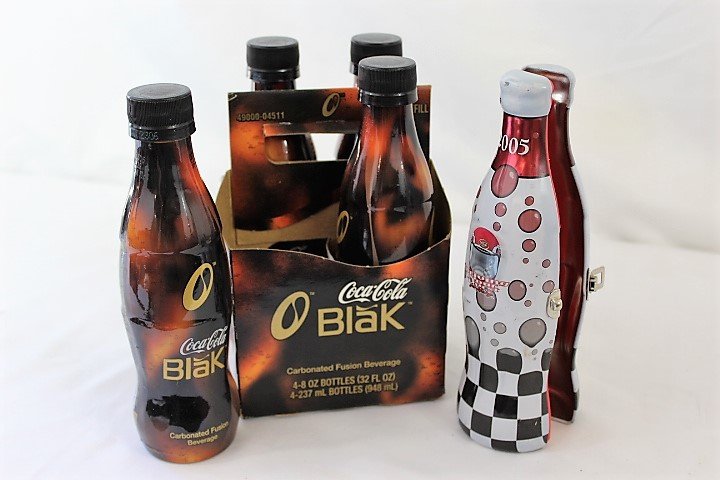 Coca-Cola Black Carten and 1 2005 Coca-Coloa Bottle Tin: bottles measure about 8 inches tall