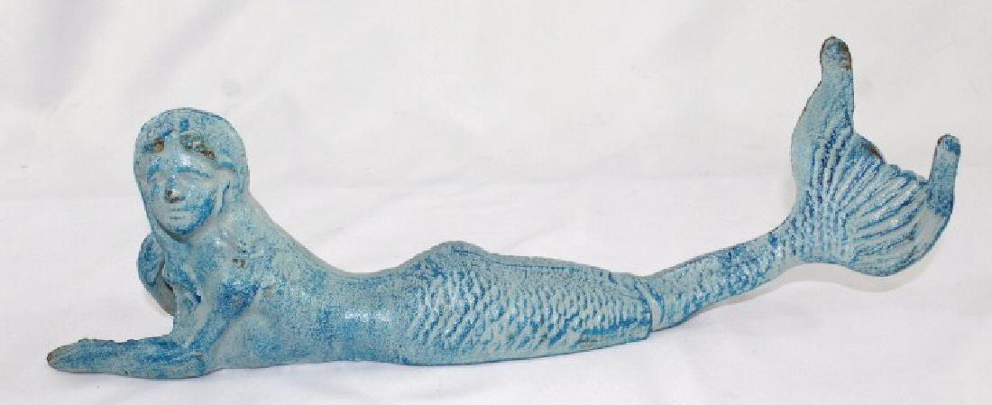 Blue Cast Iron Mermaid Reclining Door Stop: measures about 17 1/2 inches long by 5 inches tall