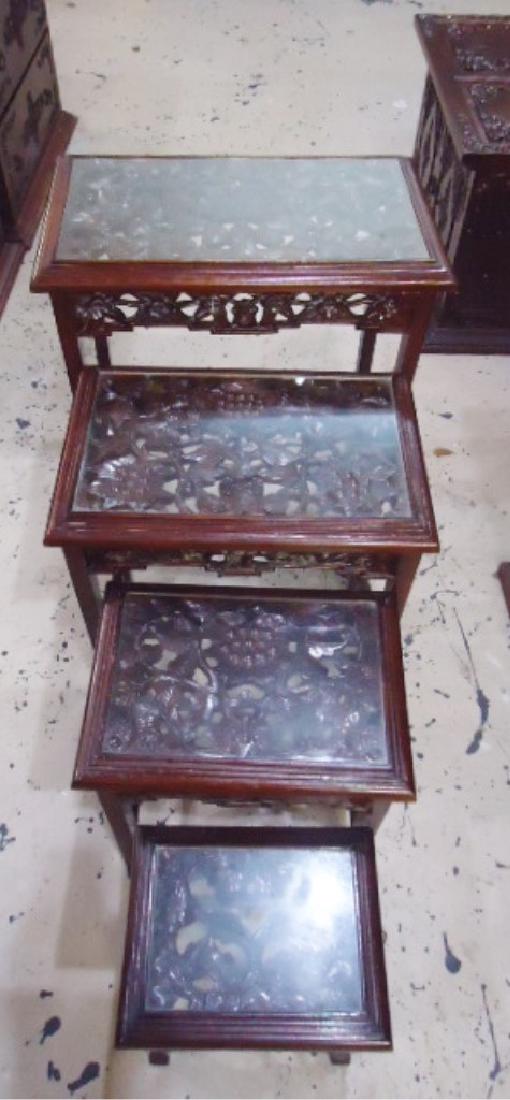 4 Asian Style Nesting Tables with Glass Tops: 4 Wood carved nesting tables with glass tops