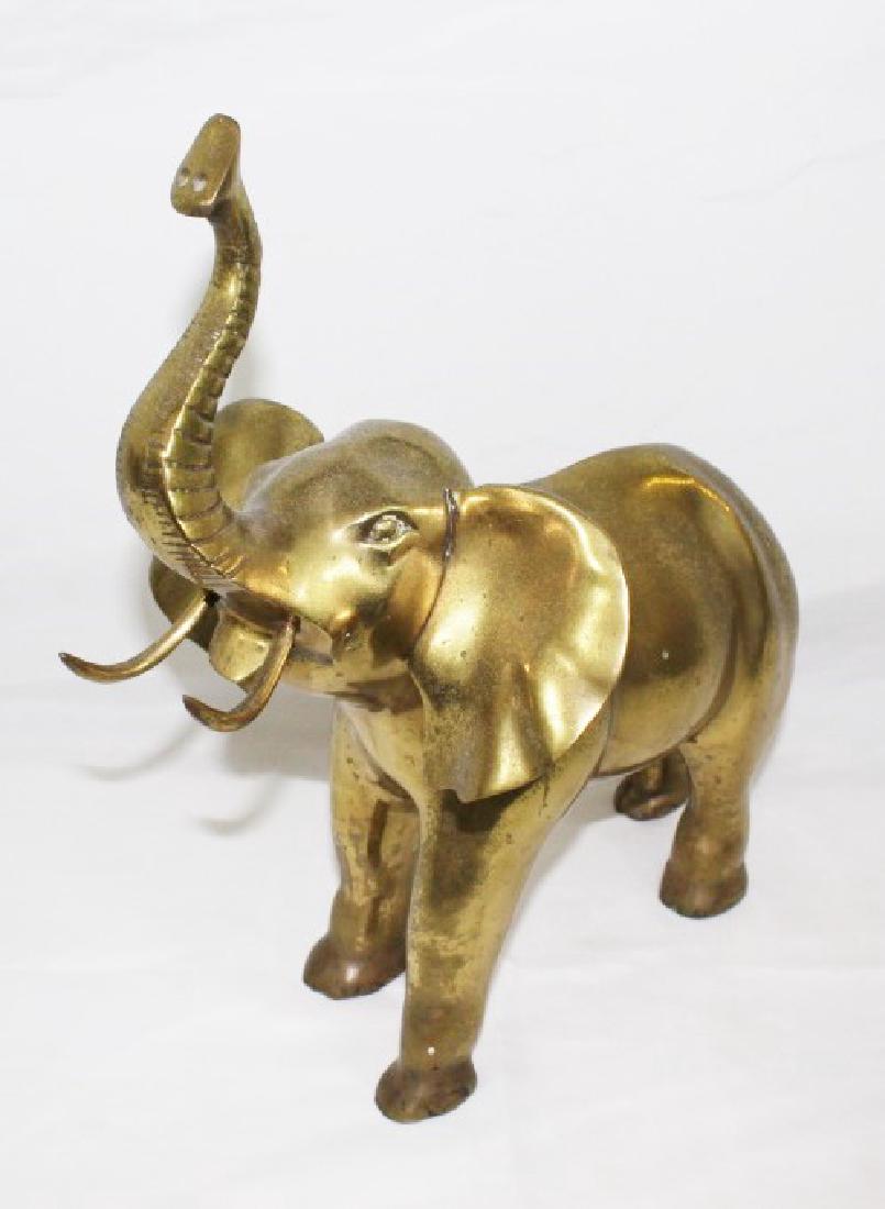 Brass Elephant Tusk Up