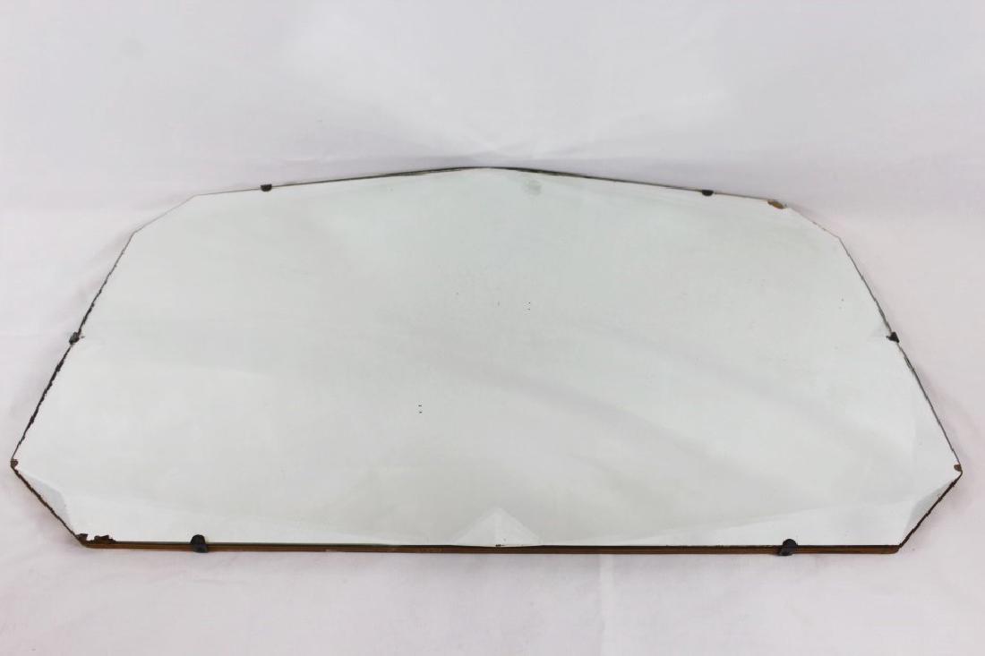 Unusual Shaped Antique Mirror: measures about 25 inches by 15 inches