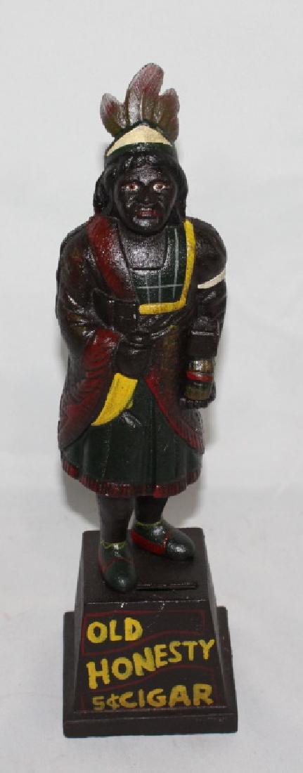 Old Honesty Cigar - Cast Iron Bank: measures about 13 1/2 inches tall by 3 1/2 inches wide at base
