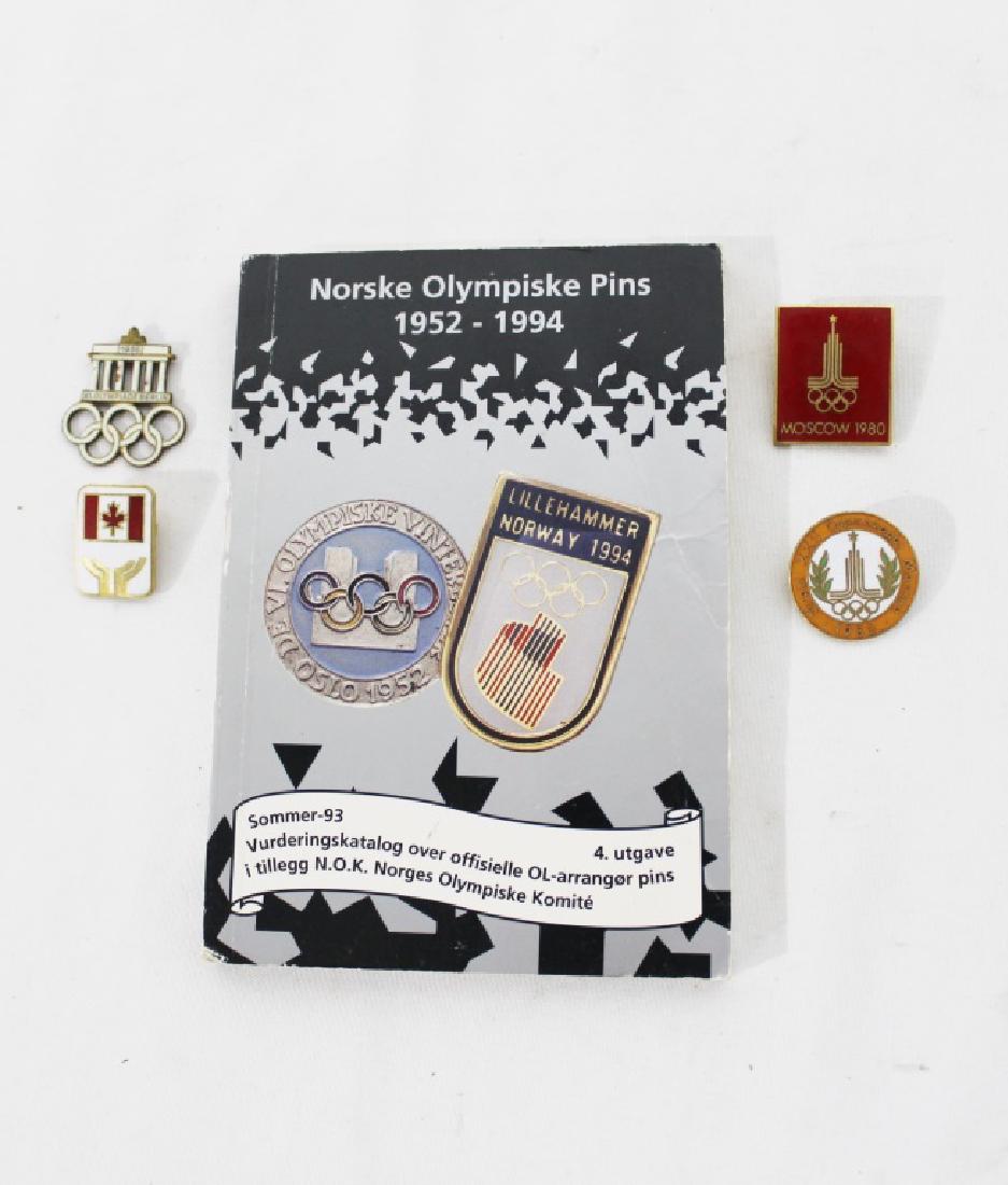 Misc Lot of Olympic Pins & book: 1936 Berlin Olympic Pin, Russian Olympic Pin, Canada as pictured