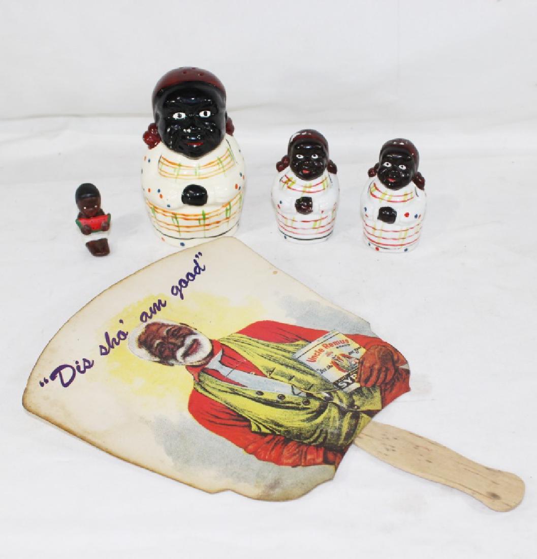 VTG Black Americana Lot w/ Salt Pepper Shakers: Includes 2 S & P shakers approx 3" tall, 1 cheese shaker approx 4.5" tall, small child figure approx 2" tall and an Uncle Remus Church Fan approx 12" tall and 8" wide.